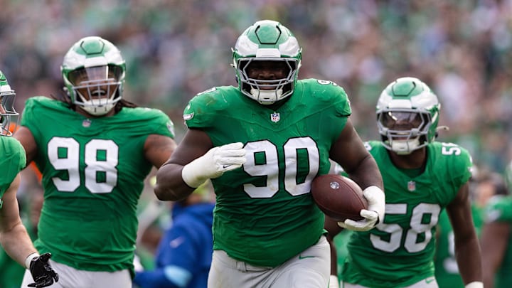 Dec 29, 2024; Philadelphia, Pennsylvania, USA; Philadelphia Eagles defensive tackle Jordan Davis (90) celebrate with teammates after his fumble recovery against the Dallas Cowboys during the second quarter at Lincoln Financial Field. Mandatory Credit: Bill Streicher-Imagn Images