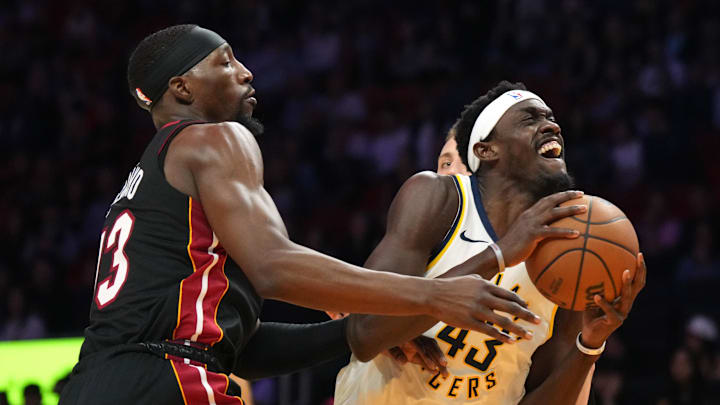 Jan 2, 2025; Miami, Florida, USA;  Indiana Pacers forward Pascal Siakam (43) goes up for a shot past Miami Heat center Bam Adebayo (13) during the first half at Kaseya Center. Mandatory Credit: Jim Rassol-Imagn Images