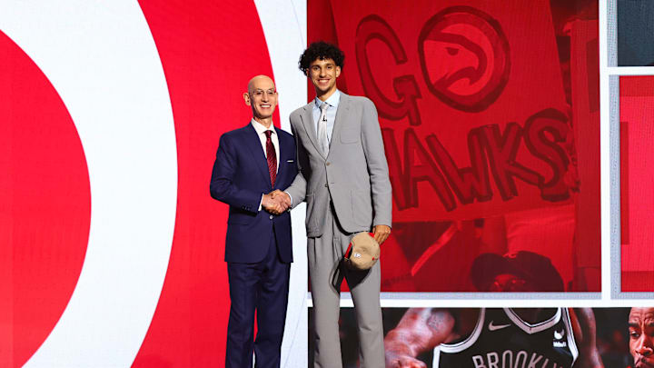 First-overall pick Zaccharie Risacher and Adam Silver