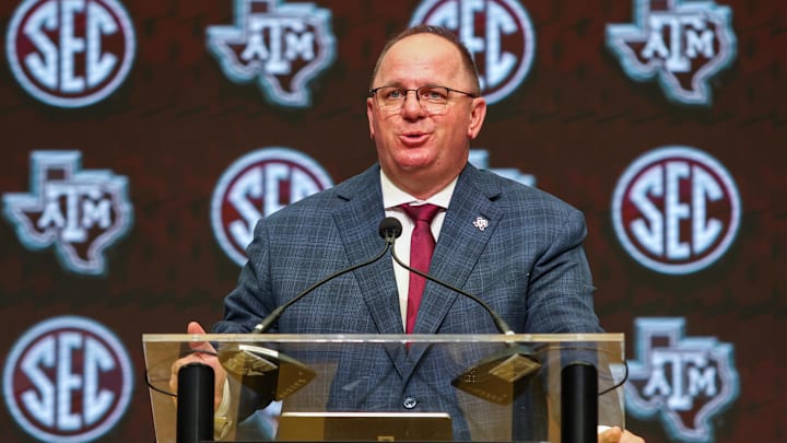 Jul 17, 2025; Atlanta, GA, USA; Texas A&M Aggies head coach Mike Elko talks to the media during the SEC Media Days at Omni Atlanta Hotel. Mandatory Credit: Jordan Godfree-Imagn Images