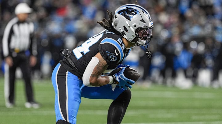 Dec 1, 2024; Charlotte, North Carolina, USA; Carolina Panthers running back Jonathon Brooks (24) runs for yardage against the Tampa Bay Buccaneers during the second half at Bank of America Stadium. Mandatory Credit: Jim Dedmon-Imagn Images