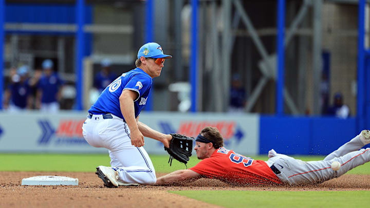 Kasevich applies a tag on Braiden Ward.