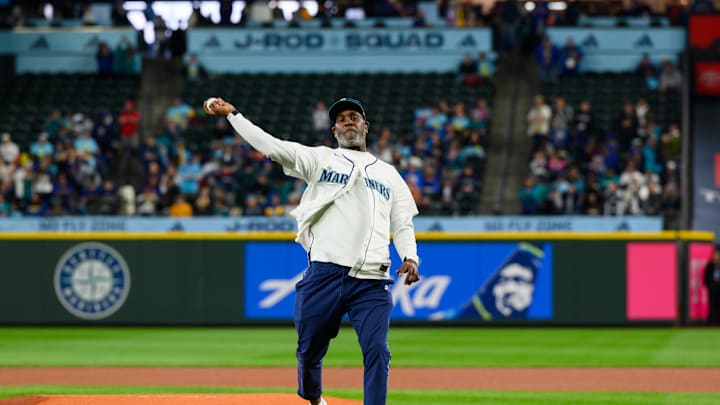 NBA Hall of Fame member Gary Payton throws out the ceremonial first pitch before the game between the Seattle Mariners and the Detroit Tigers at T-Mobile Park on April 1.