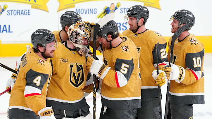 Apr 29, 2026; Las Vegas, Nevada, USA; Vegas Golden Knights players celebrate after defeating the Utah Mammoth 5-4 during the second overtime period of game five of the first round of the 2026 Stanley Cup Playoffs at T-Mobile Arena. Mandatory Credit: Stephen R. Sylvanie-Imagn Images