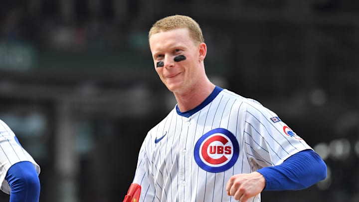 Aug 16, 2025; Chicago, Illinois, USA; Chicago Cubs center fielder Pete Crow-Armstrong (4) reacts after getting hit by a pitch during the sixth inning against the Pittsburgh Pirates at Wrigley Field. Mandatory Credit: Patrick Gorski-Imagn Images