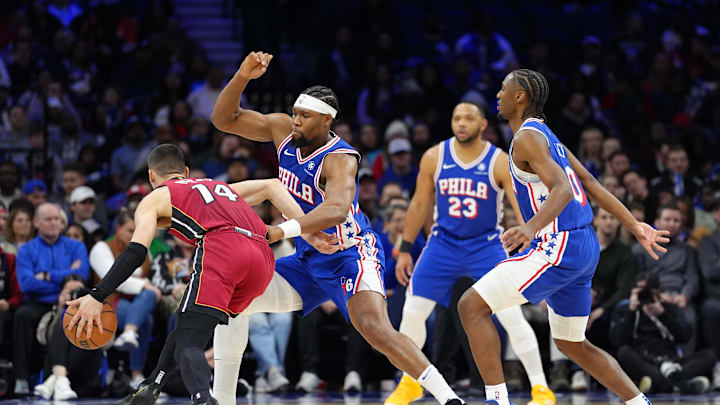 Feb 5, 2025; Philadelphia, Pennsylvania, USA; Philadelphia 76ers forward Guerschon Yabusele (28) defends Miami Heat guard Tyler Herro (14) in the fourth quarter at Wells Fargo Center. Mandatory Credit: Kyle Ross-Imagn Images