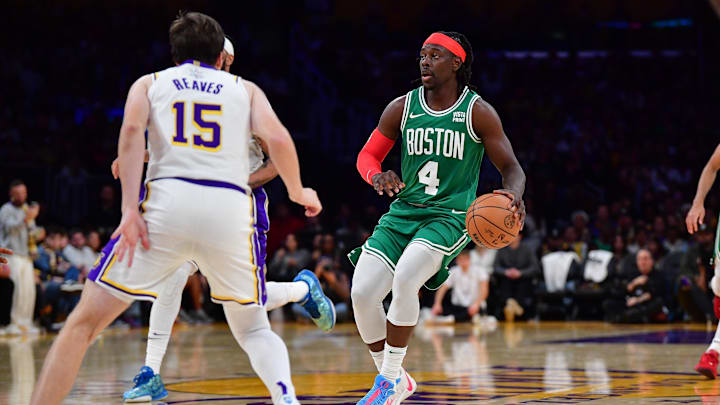 Dec 25, 2023; Los Angeles, California, USA; Boston Celtics guard Jrue Holiday (4) moves the ball against the Los Angeles Lakers during the second half at Crypto.com Arena. Mandatory Credit: Gary A. Vasquez-Imagn Images