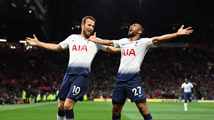 Harry Kane and Lucas celebrate at Old Trafford 