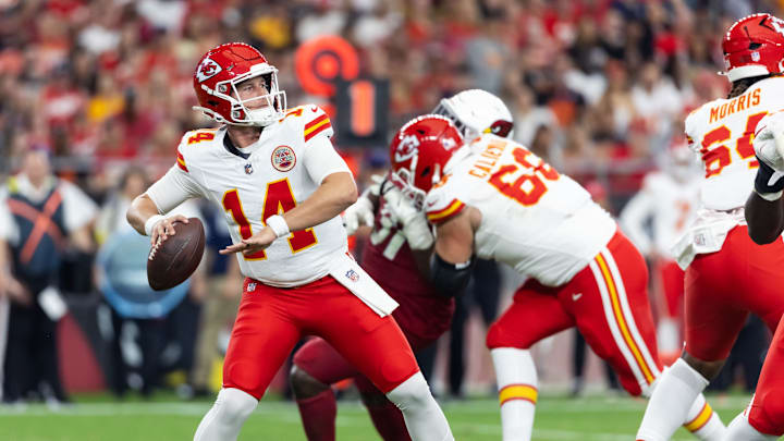 Aug 9, 2025; Glendale, Arizona, USA; Kansas City Chiefs quarterback Bailey Zappe (14) against the Arizona Cardinals during a preseason NFL game at State Farm Stadium. Mandatory Credit: Mark J. Rebilas-Imagn Images