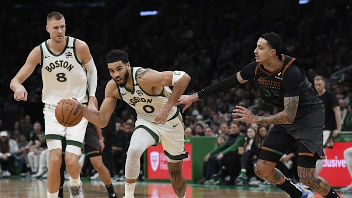 Feb 9, 2024; Boston, Massachusetts, USA; Boston Celtics forward Jayson Tatum (0) controls the ball