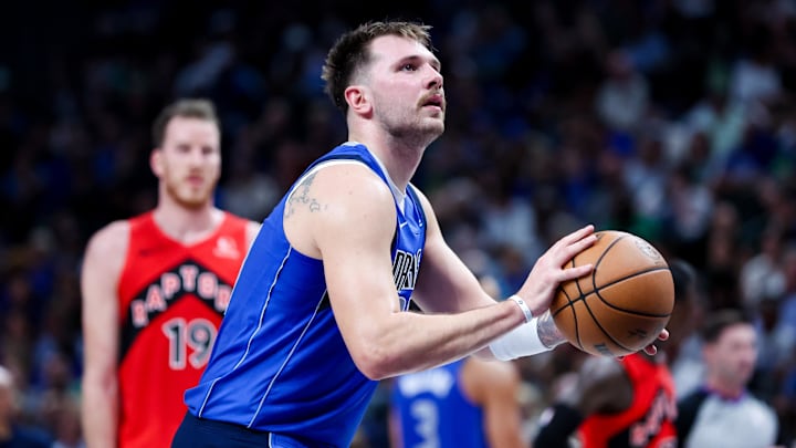 Dallas Mavericks guard Luka Doncic (77) shoots a free throw.