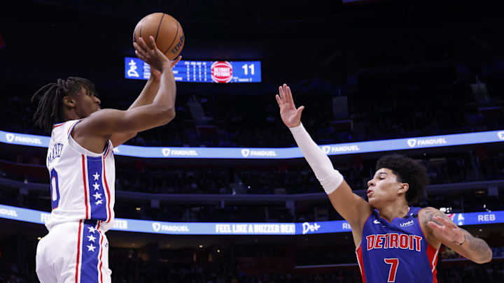 Jan 8, 2023; Detroit, Michigan, USA;  Philadelphia 76ers guard Tyrese Maxey (0) shoots on Detroit Pistons guard Killian Hayes (7) in the first half at Little Caesars Arena. Mandatory Credit: Rick Osentoski-Imagn Images