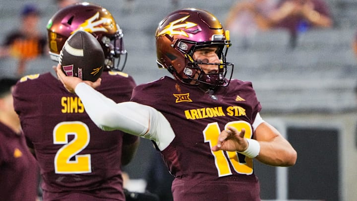 Sep 13, 2025; Tempe, Arizona, USA; Arizona State Sun Devils quarterback Sam Leavitt warms up before the game between Arizona State Sun Devils and Texas State Bobcats. Mandatory Credit: Arianna Grainey-Imagn Images