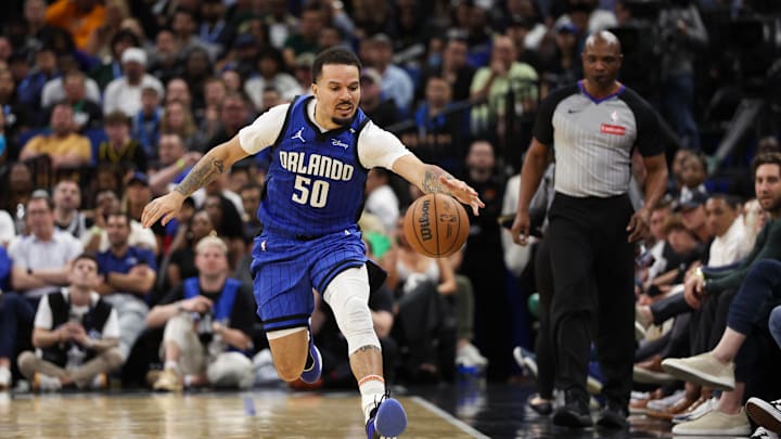 Feb 27, 2025; Orlando, Florida, USA; Orlando Magic guard Cole Anthony (50) saves a ball from going out of bounds against the Golden State Warriors in the fourth quarter at Kia Center. Mandatory Credit: Nathan Ray Seebeck-Imagn Images
