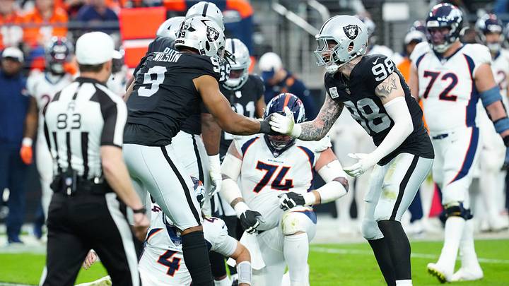 Jan 7, 2024; Paradise, Nevada, USA; Las Vegas Raiders defensive end Tyree Wilson (9) celebrates with Las Vegas Raiders defensive end Maxx Crosby (98) after sacking Denver Broncos quarterback Jarrett Stidham (4) during the second quarter at Allegiant Stadium. Mandatory Credit: Stephen R. Sylvanie-USA TODAY Sports Jan 7, 2024; Paradise, Nevada, USA; Las Vegas Raiders defensive end Tyree Wilson (9) celebrates with Las Vegas Raiders defensive end Maxx Crosby (98) after sacking Denver Broncos quarterback Jarrett Stidham (4) during the second quarter at Allegiant Stadium. Mandatory Credit: Stephen R. Sylvanie-USA TODAY Sports