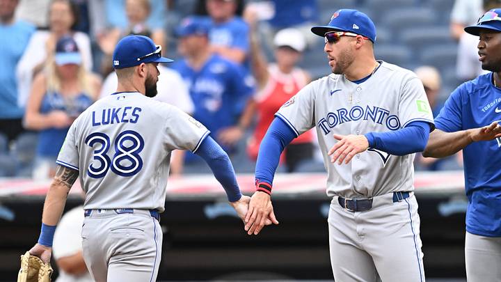 Toronto Blue Jays right fielder Nathan Lukes celebrates with designated hitter George Springer. Mandatory Credit: Ken Blaze-Imagn Images Toronto Blue Jays right fielder Nathan Lukes celebrates with designated hitter George Springer. Mandatory Credit: Ken Blaze-Imagn Images