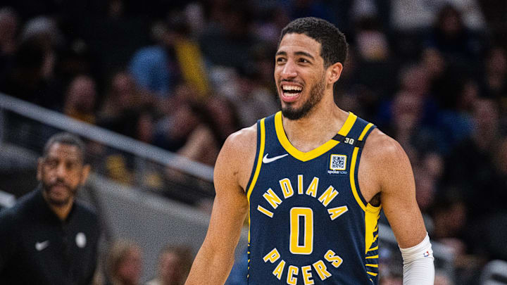 Apr 1, 2024; Indianapolis, Indiana, USA; Indiana Pacers guard Tyrese Haliburton (0) reacts to a shot