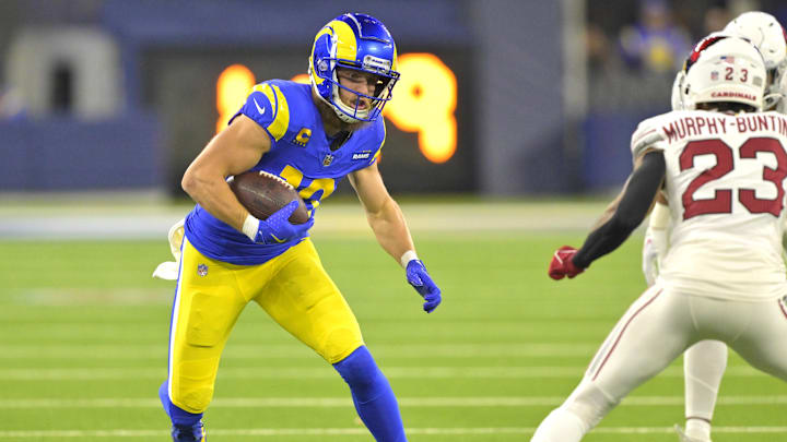 Dec 28, 2024; Inglewood, California, USA;   Los Angeles Rams wide receiver Cooper Kupp (10) ains 10 yards on a pass play before he is stopped by Arizona Cardinals cornerback Sean Murphy-Bunting (23) in the first half at SoFi Stadium. Mandatory Credit: Jayne Kamin-Oncea-Imagn Images