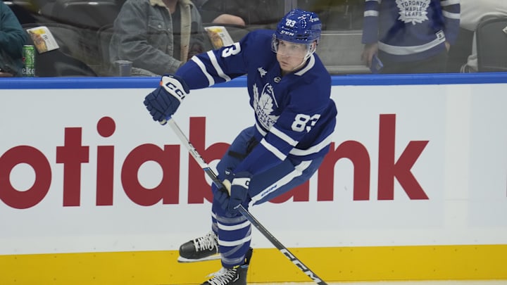Sep 25, 2023; Toronto, Ontario, CAN; Toronto Maple Leafs defenseman Marshall Rifai (83) goes to pass the puck during warm up before a game against the Ottawa Senators at Scotiabank Arena. Mandatory Credit: John E. Sokolowski-Imagn Images
