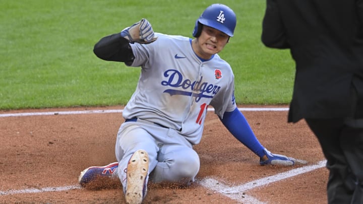 Los Angeles Dodgers designated hitter Shohei Ohtani (17) scores in the fifth inning against the Cleveland Guardians at Progressive Field on May 26.