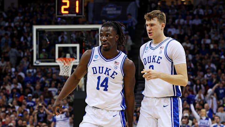 Mar 29, 2025; Newark, NJ, USA; Duke Blue Devils guard Sion James (14) and forward Cooper Flagg (2) celebrates during the first half against the Alabama Crimson Tide in the East Regional final of the 2025 NCAA tournament at Prudential Center. Mandatory Credit: Vincent Carchietta-Imagn Images Mar 29, 2025; Newark, NJ, USA; Duke Blue Devils guard Sion James (14) and forward Cooper Flagg (2) celebrates during the first half against the Alabama Crimson Tide in the East Regional final of the 2025 NCAA tournament at Prudential Center. Mandatory Credit: Vincent Carchietta-Imagn Images