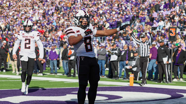 Texas Tech Red Raiders running back Cameron Dickeycelebrates after scoring a touchdown. Mandatory Credit: Scott Sewell-Imagn Images Texas Tech Red Raiders running back Cameron Dickeycelebrates after scoring a touchdown. Mandatory Credit: Scott Sewell-Imagn Images