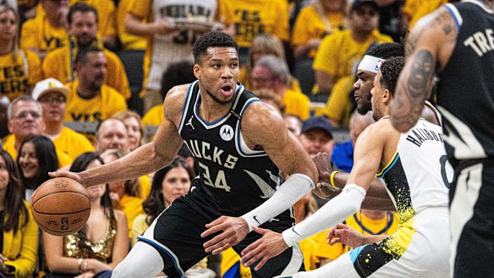 Apr 29, 2025; Indianapolis, Indiana, USA; Milwaukee Bucks forward Giannis Antetokounmpo (34) dribbles the ball while Indiana Pacers forward Jarace Walker (5) defends during game five of the first round for the 2024 NBA Playoffs at Gainbridge Fieldhouse. Mandatory Credit: Trevor Ruszkowski-Imagn Images Apr 29, 2025; Indianapolis, Indiana, USA; Milwaukee Bucks forward Giannis Antetokounmpo (34) dribbles the ball while Indiana Pacers forward Jarace Walker (5) defends during game five of the first round for the 2024 NBA Playoffs at Gainbridge Fieldhouse. Mandatory Credit: Trevor Ruszkowski-Imagn Images
