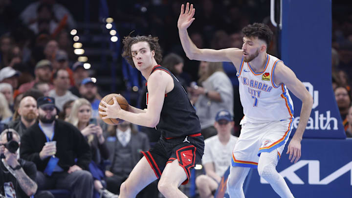 Mar 31, 2025; Oklahoma City, Oklahoma, USA; Oklahoma City Thunder forward Chet Holmgren (7) defends Chicago Bulls guard Josh Giddey (3) during the second quarter at Paycom Center. Mandatory Credit: Alonzo Adams-Imagn Images