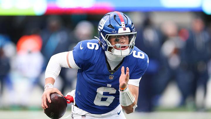 Jan 4, 2026; East Rutherford, New Jersey, USA; New York Giants quarterback Jaxson Dart (6) scrambles during the fourth quarter against the Dallas Cowboys at MetLife Stadium.  
