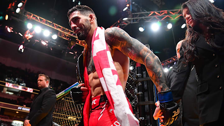 Feb 17, 2024; Anaheim, California, USA; Ilia Topuria celebrates his championship victory against Alexander Volkanovski during UFC 298 at Honda Center.