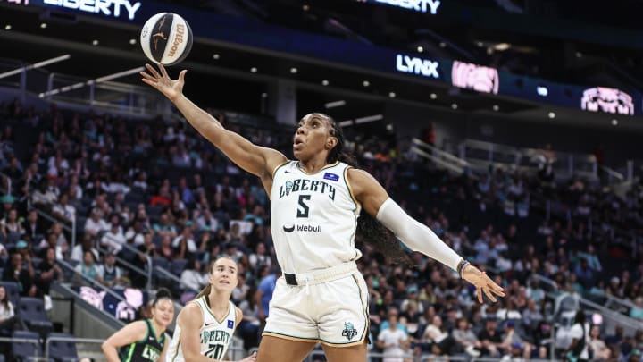Jun 25, 2024; Belmont Park, New York, USA; New York Liberty forward Kayla Thornton (5) grabs a rebound against the Minnesota Lynx in the first quarter of the Commissioner’s Cup Championship game at UBS Arena. Mandatory Credit: Wendell Cruz-USA TODAY Sports Jun 25, 2024; Belmont Park, New York, USA; New York Liberty forward Kayla Thornton (5) grabs a rebound against the Minnesota Lynx in the first quarter of the Commissioner’s Cup Championship game at UBS Arena. Mandatory Credit: Wendell Cruz-USA TODAY Sports