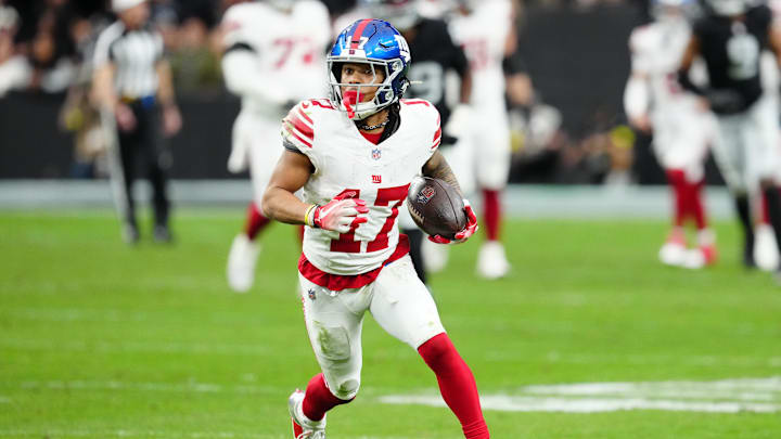 Dec 28, 2025; Paradise, Nevada, USA; New York Giants wide receiver Wan'Dale Robinson (17) runs with the ball after a catch in the second quarter against the Las Vegas Raiders at Allegiant Stadium. Mandatory Credit: Stephen R. Sylvanie-Imagn Images