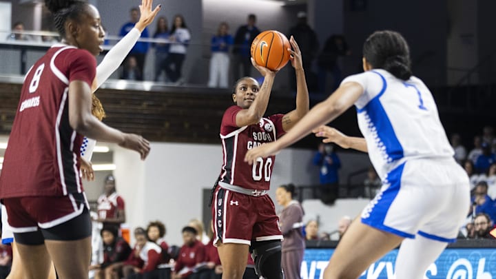Mar 1, 2026; Lexington, Kentucky, USA; South Carolina Gamecocks guard Ta'Niya Latson (00) shoots a three-point shot during the second quarter at Memorial Coliseum. Mandatory Credit: Arden Barnes-Imagn Images
