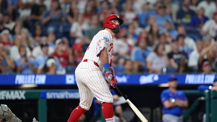 Jun 20, 2026; Philadelphia, Pennsylvania, USA; Philadelphia Phillies designated hitter Kyle Schwarber (12) watches the ball after hitting a two-run home run against the New York Mets in the seventh inning at Citizens Bank Park. 