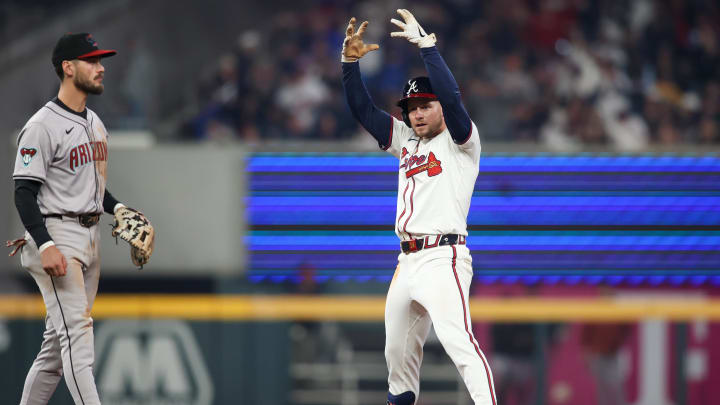 Atlanta Braves left fielder Jarred Kelenic celebrates after hitting a game-tying double in the 9th inning against the Arizona Diamondbacks.