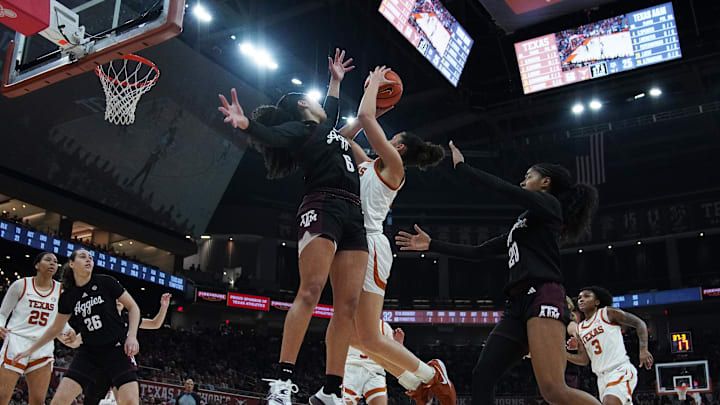Jan 18, 2026; Austin, Texas, USA; Texas Longhorns guard Aaliyah Crump (23) takes a jump shot against Texas A&M Aggies guard Jordan Webster (6) during the second half at Moody Center. Mandatory Credit: Dustin Safranek-Imagn Images Jan 18, 2026; Austin, Texas, USA; Texas Longhorns guard Aaliyah Crump (23) takes a jump shot against Texas A&M Aggies guard Jordan Webster (6) during the second half at Moody Center. Mandatory Credit: Dustin Safranek-Imagn Images