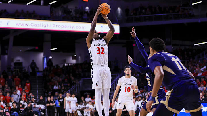 Nov 16, 2025; Cincinnati, Ohio, USA; Cincinnati Bearcats forward Jalen Celestine (32) shoots against the Mount St. Mary's Mountaineers in the first half at Fifth Third Arena. Mandatory Credit: Katie Stratman-Imagn Images Nov 16, 2025; Cincinnati, Ohio, USA; Cincinnati Bearcats forward Jalen Celestine (32) shoots against the Mount St. Mary's Mountaineers in the first half at Fifth Third Arena. Mandatory Credit: Katie Stratman-Imagn Images