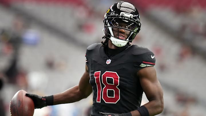 Arizona Cardinals receiver Marvin Harrison Jr. (18) warms up before their game against the Tennessee Titans at State Farm Stadium in Glendale on Oct. 5, 2025.