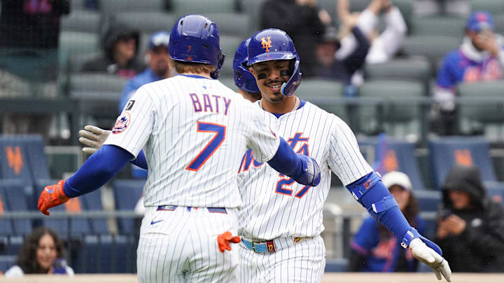 May 28, 2025; New York, New York, USA; New York Mets third baseman Mark Vientos (27) celebrates with New York Mets third baseman Brett Baty (7) after hitting a home run during the third inning against the Chicago White Sox at Citi Field. Mandatory Credit: Lucas Boland-Imagn Images