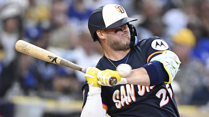Jun 26, 2026; San Diego, California, USA; San Diego Padres first baseman Ty France (25) is hit with a pitch during the fourth inning against the Los Angeles Dodgers at Petco Park. Mandatory Credit: Denis Poroy-Imagn Images