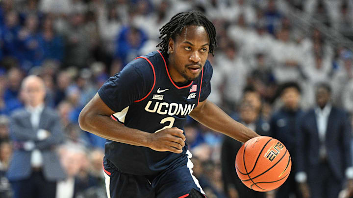 Feb 20, 2024; Omaha, Nebraska, USA;  Connecticut Huskies guard Tristen Newton (2) dribbles against