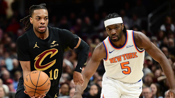 Feb 21, 2025; Cleveland, Ohio, USA;  Cleveland Cavaliers guard Darius Garland (10) drives to the basket against New York Knicks forward Precious Achiuwa (5) during the second half at Rocket Arena. Mandatory Credit: Ken Blaze-Imagn Images