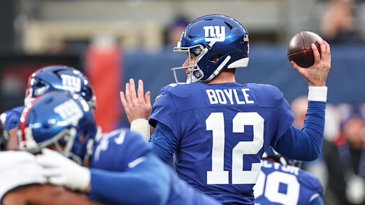 Dec 15, 2024; East Rutherford, New Jersey, USA; New York Giants quarterback Tim Boyle (12) throws the ball during the second half against the Baltimore Ravens at MetLife Stadium. Dec 15, 2024; East Rutherford, New Jersey, USA; New York Giants quarterback Tim Boyle (12) throws the ball during the second half against the Baltimore Ravens at MetLife Stadium.