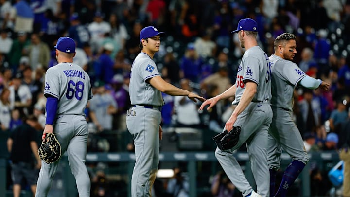 Apr 20, 2026; Denver, Colorado, USA; Los Angeles Dodgers designated hitter Shohei Ohtani (17) celebrates with relief pitcher Jake Eder (56) and first baseman Dalton Rushing (68) and shortstop Miguel Rojas (72) after the game against the Colorado Rockies at Coors Field. Mandatory Credit: Isaiah J. Downing-Imagn Images
