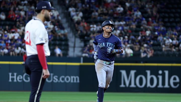 Sep 20, 2024; Arlington, Texas, USA; Seattle Mariners center fielder Julio Rodriguez (44) rounds the bases after hitting a three-run home run against the Texas Rangers in the fifth inning at Globe Life Field. Mandatory Credit: Tim Heitman-Imagn Images