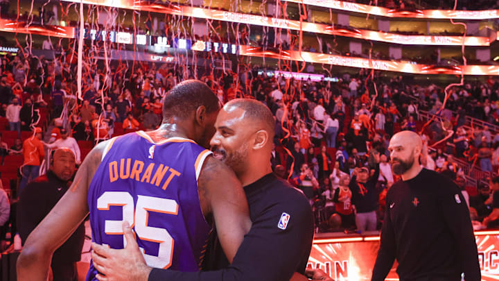 Feb 12, 2025; Houston, Texas, USA; Phoenix Suns forward Kevin Durant (35) hugs Houston Rockets head coach Ime Udoka after a game at Toyota Center. Mandatory Credit: Thomas Shea-Imagn Images