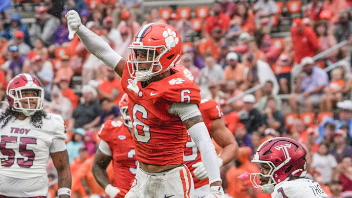 Clemson cornerback Ricardo Jones (6) reacts after tackling Troy Trojans receiver RaRa Thomas (7) during the second quarter at Memorial Stadium in Clemson, S.C. Saturday, September 6, 2025.
