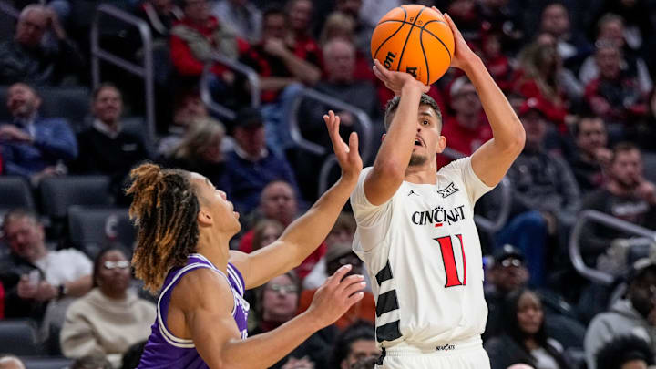 Cincinnati Bearcats guard Kerr Kriisa (11) shoots from the corner in the second half of the NCAA men’s basketball game between the Cincinnati Bearcats and the Tarleton State Texans at Fifth Third Arena in Cincinnati on Monday, Dec. 1, 2025. The Bearcats won 76-58.