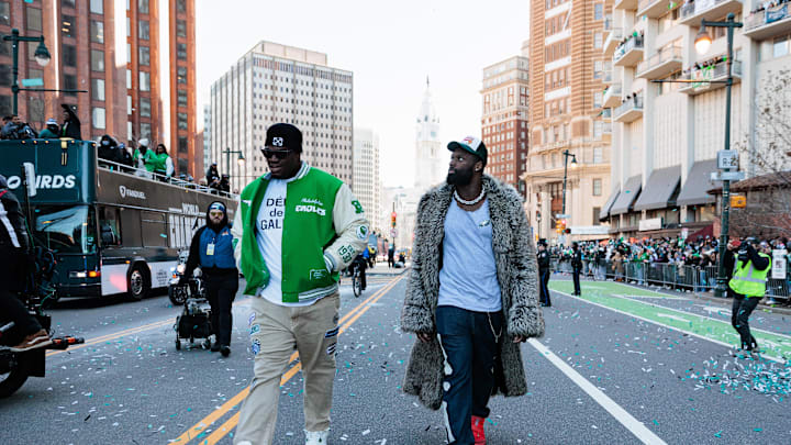 Feb 14, 2025; Philadelphia, PA, USA; Philadelphia Eagles defensive tackle Jordan Davis (90) and linebacker Josh Sweat (19) celebrate during the Super Bowl LIX championship parade and rally. Mandatory Credit: Caean Couto-Imagn Images