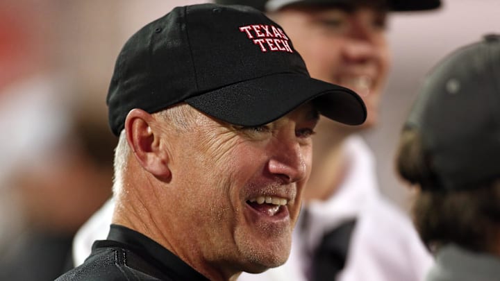 Dec 27, 2024; Memphis, TN, USA; Texas Tech Red Raiders head coach Joey McGuire looks on during warm ups prior to the game against the Arkansas Razorbacks at Simmons Bank Liberty Stadium. Mandatory Credit: Petre Thomas-Imagn Images Dec 27, 2024; Memphis, TN, USA; Texas Tech Red Raiders head coach Joey McGuire looks on during warm ups prior to the game against the Arkansas Razorbacks at Simmons Bank Liberty Stadium. Mandatory Credit: Petre Thomas-Imagn Images